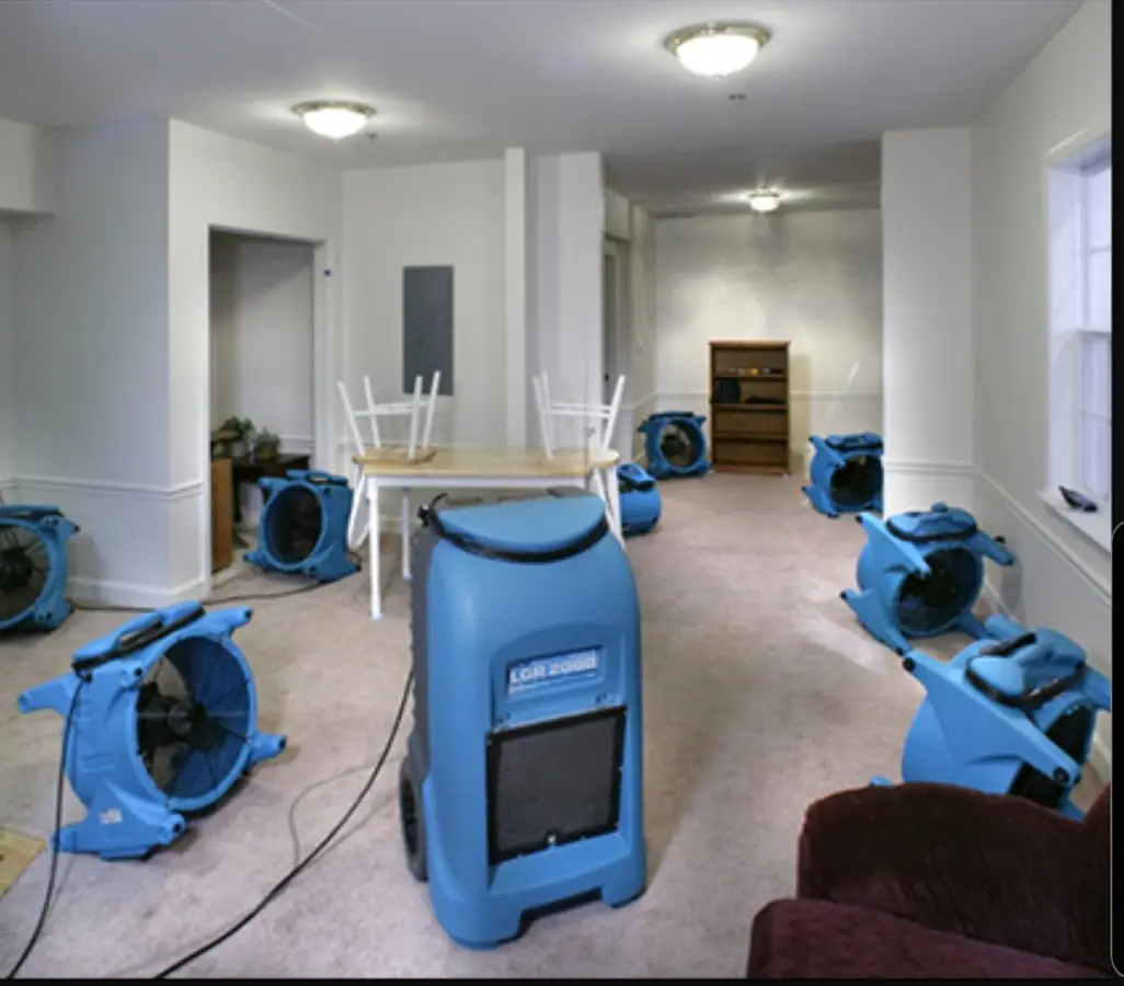 Air movers and dehumidifier setup for Water Damage Restoration in Somerset